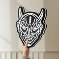 Unlit Japanese Hannya Mask LED lightbox held by hand to show size and details