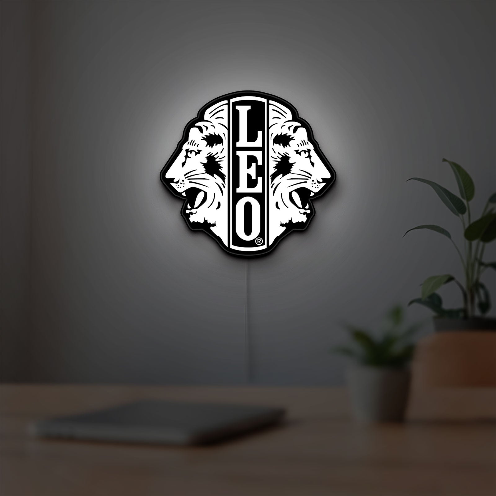 Leo Lion Zodiac LED lightbox hanging on a room wall with soft white light