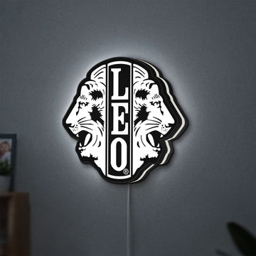 Leo Lion Zodiac LED lightbox hanging on a wall with white glow