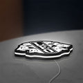 Leo Lion Zodiac LED lightbox lying flat on a desk with white glow