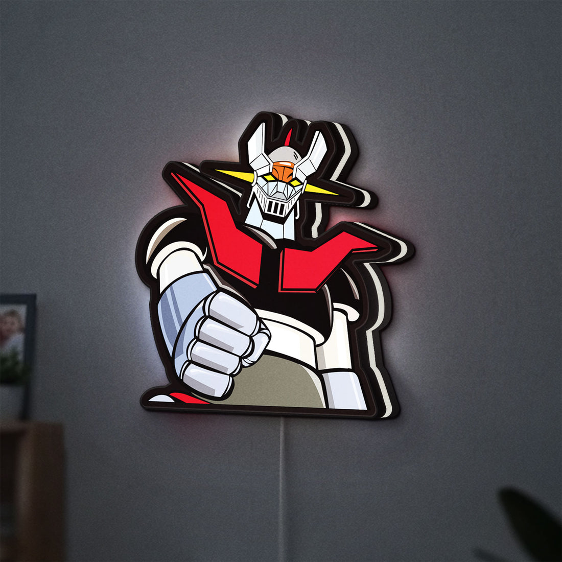 Mazinger Z LED lightbox hanging on a wall with white glow