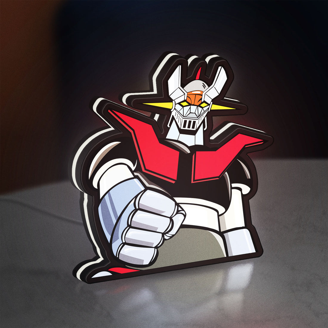 Mazinger Z LED lightbox hanging on a wall with white glow