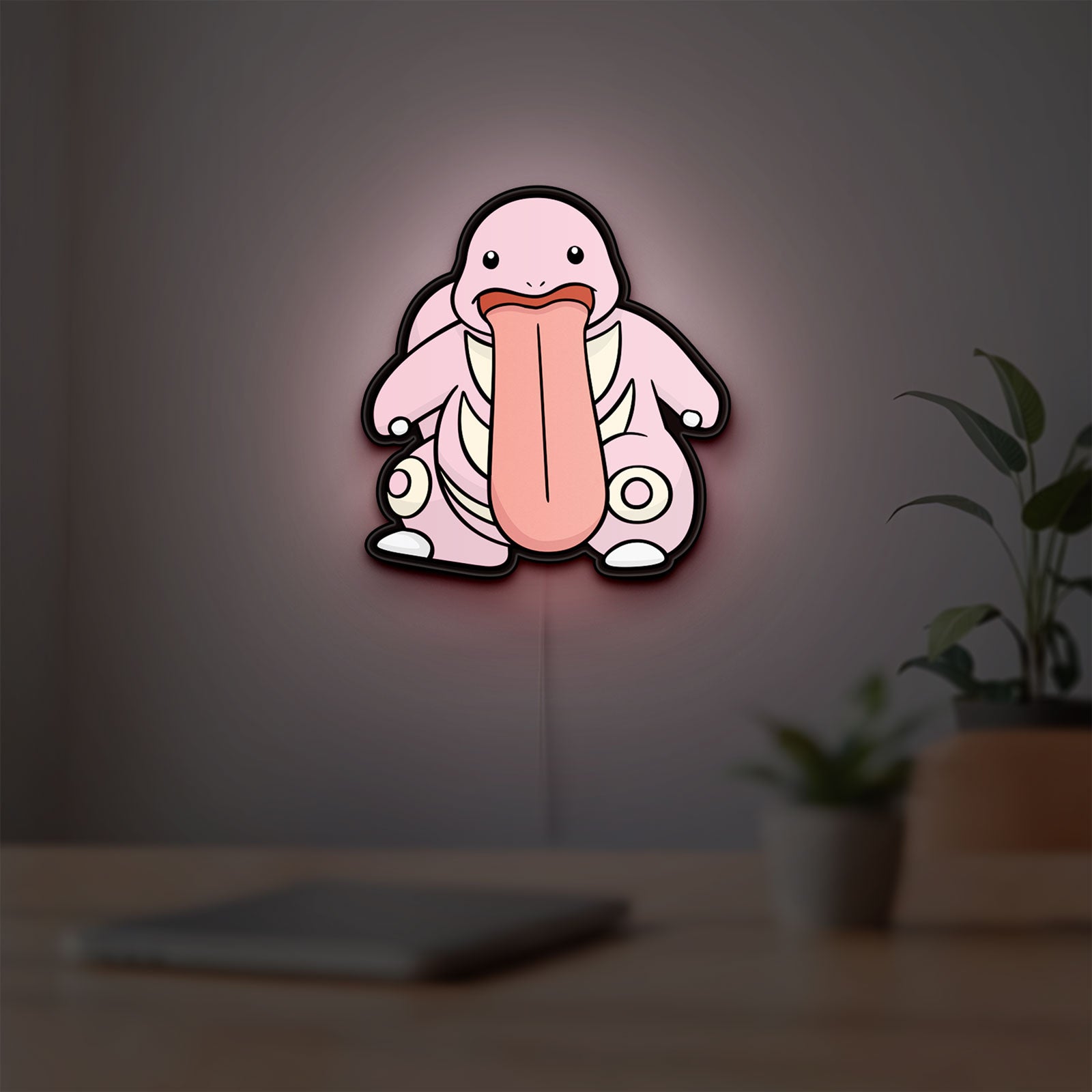 Lickitung LED lightbox hanging on a room wall with soft pink light