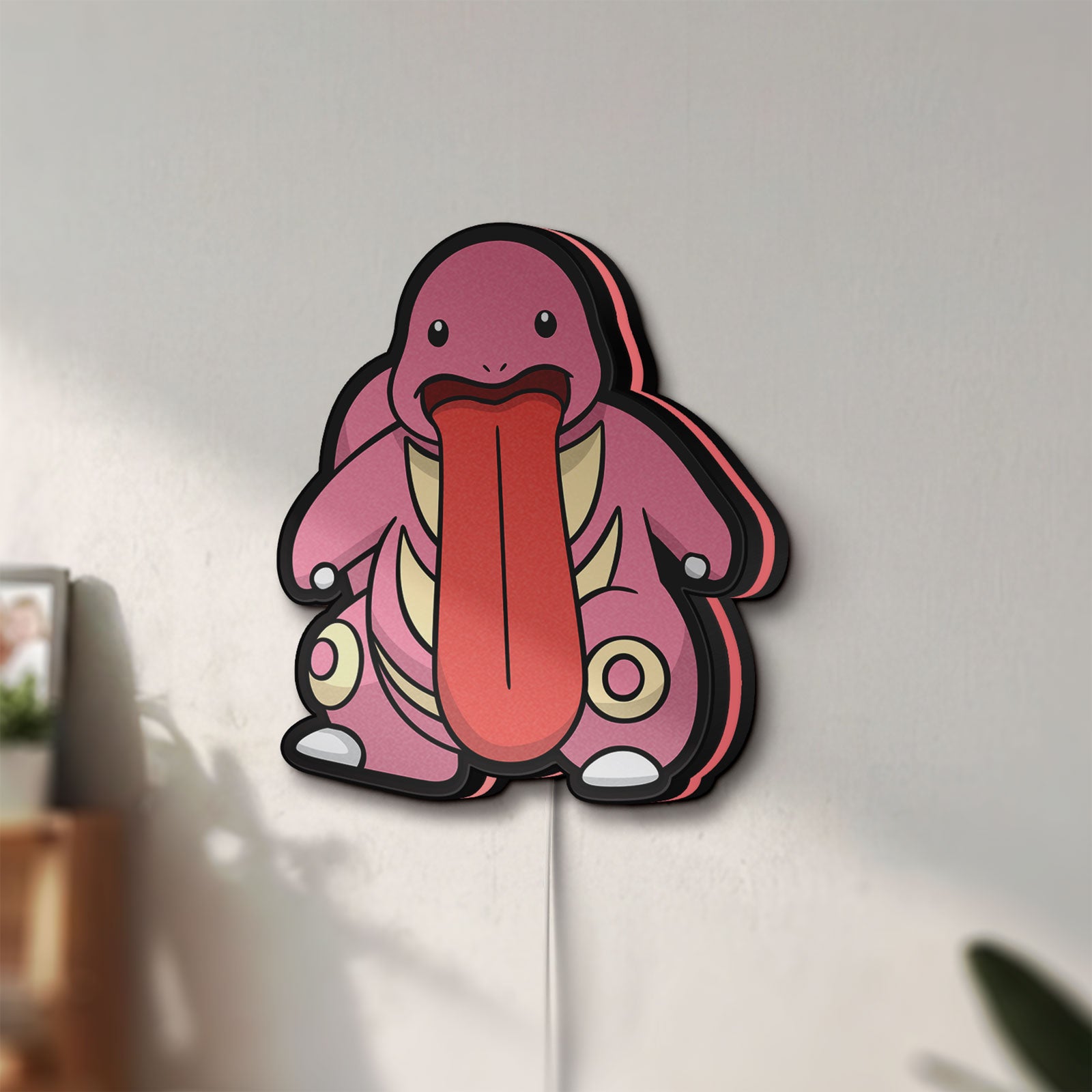 Unlit Lickitung LED lightbox mounted on a wall in daylight