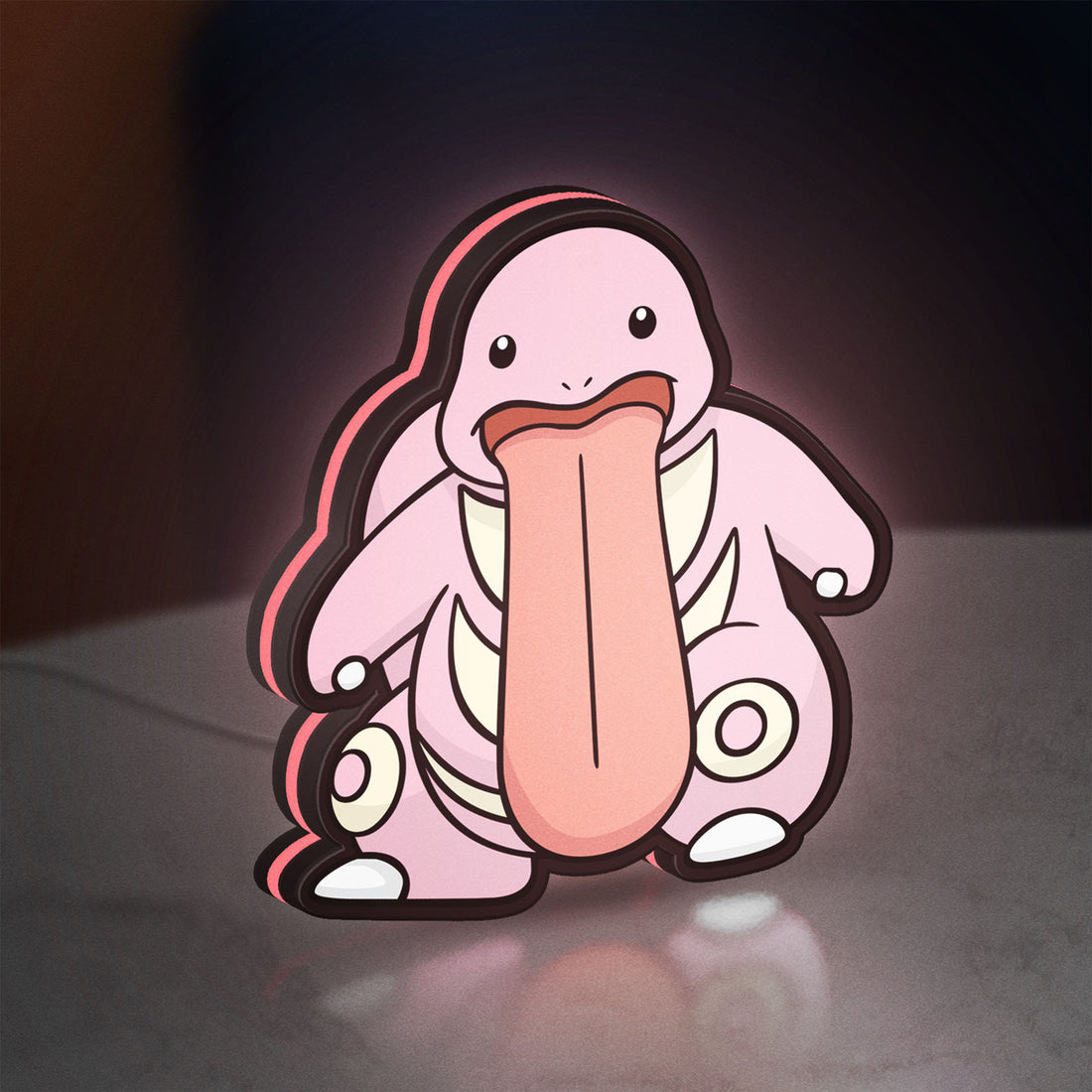 Lickitung LED lightbox hanging on a wall with pink glow