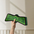 Unlit Green Lantern LED lightbox held by hand to show size and details