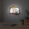 We Bare Bears LED lightbox hanging on a room wall with soft white light