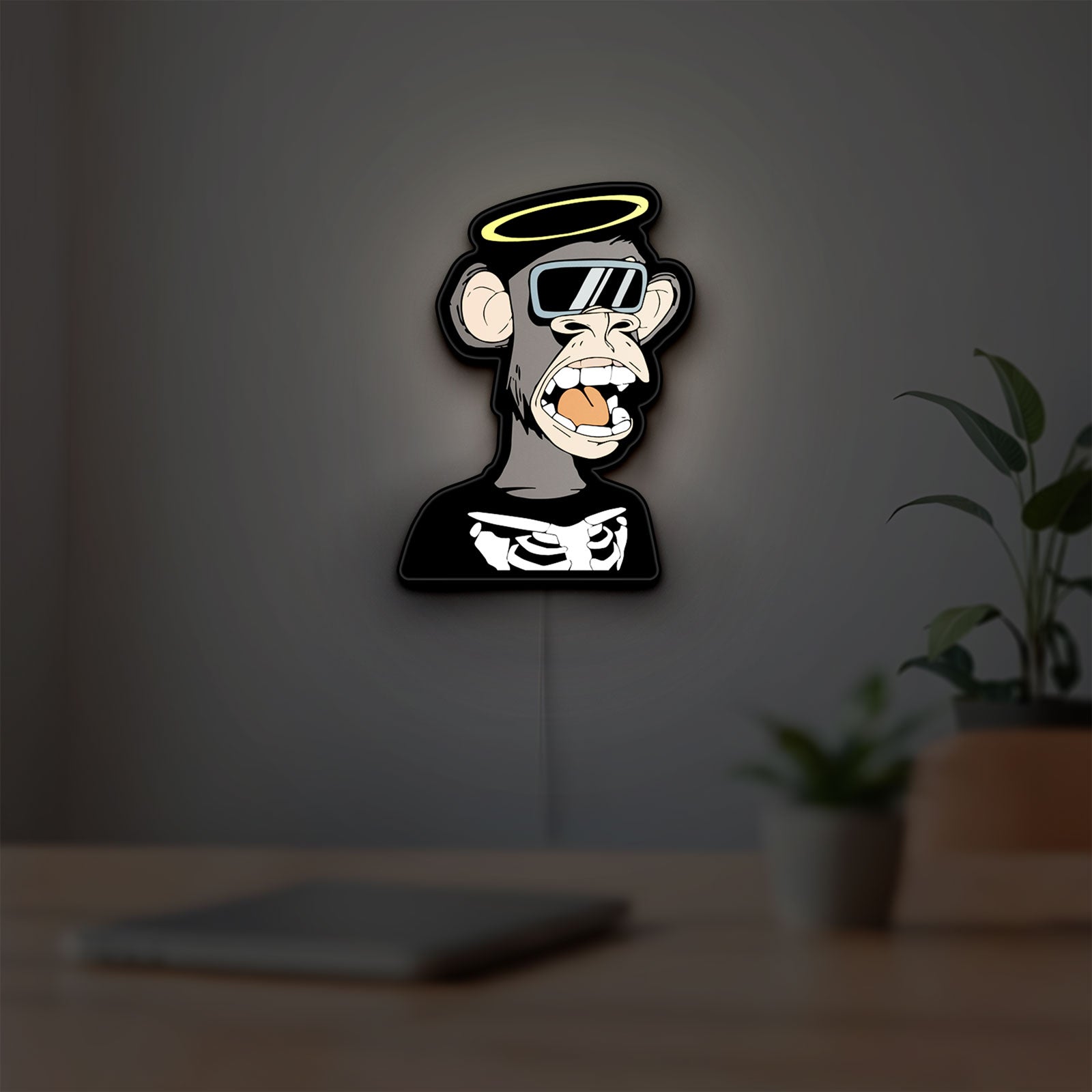 Bored Ape NFT LED lightbox hanging on a room wall with soft white light
