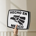 Unlit Hecho en Mexico LED lightbox held by hand to show size and details
