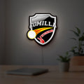 Comilla Victorians LED lightbox hanging on a room wall with soft white light