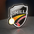 Comilla Victorians LED lightbox standing on a desk from an angled side view with white glow