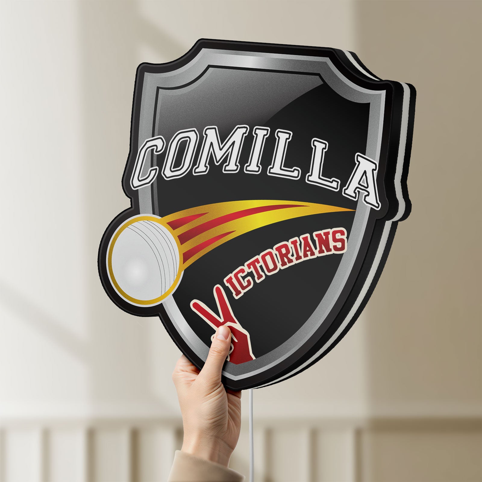 Unlit Comilla Victorians LED lightbox held by hand to show size and details