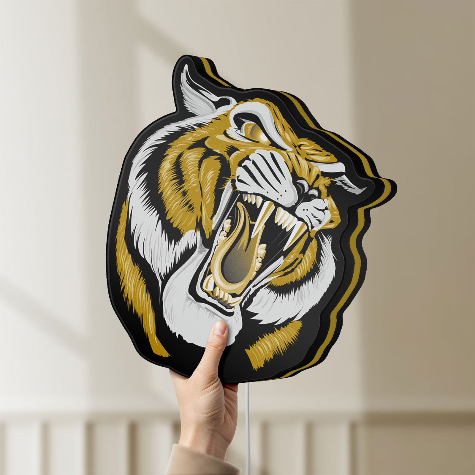 Unlit Tiger LED lightbox held by hand to show size and details