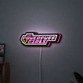 Power Puff Girls LED lightbox hanging on a wall with pink glow