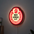 Red Horse Beer LED lightbox hanging on a wall with red glow