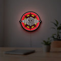 Gang Starr LED lightbox hanging on a room wall with soft red light