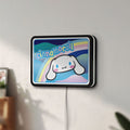 Unlit Cinnamoroll LED lightbox mounted on a wall in daylight