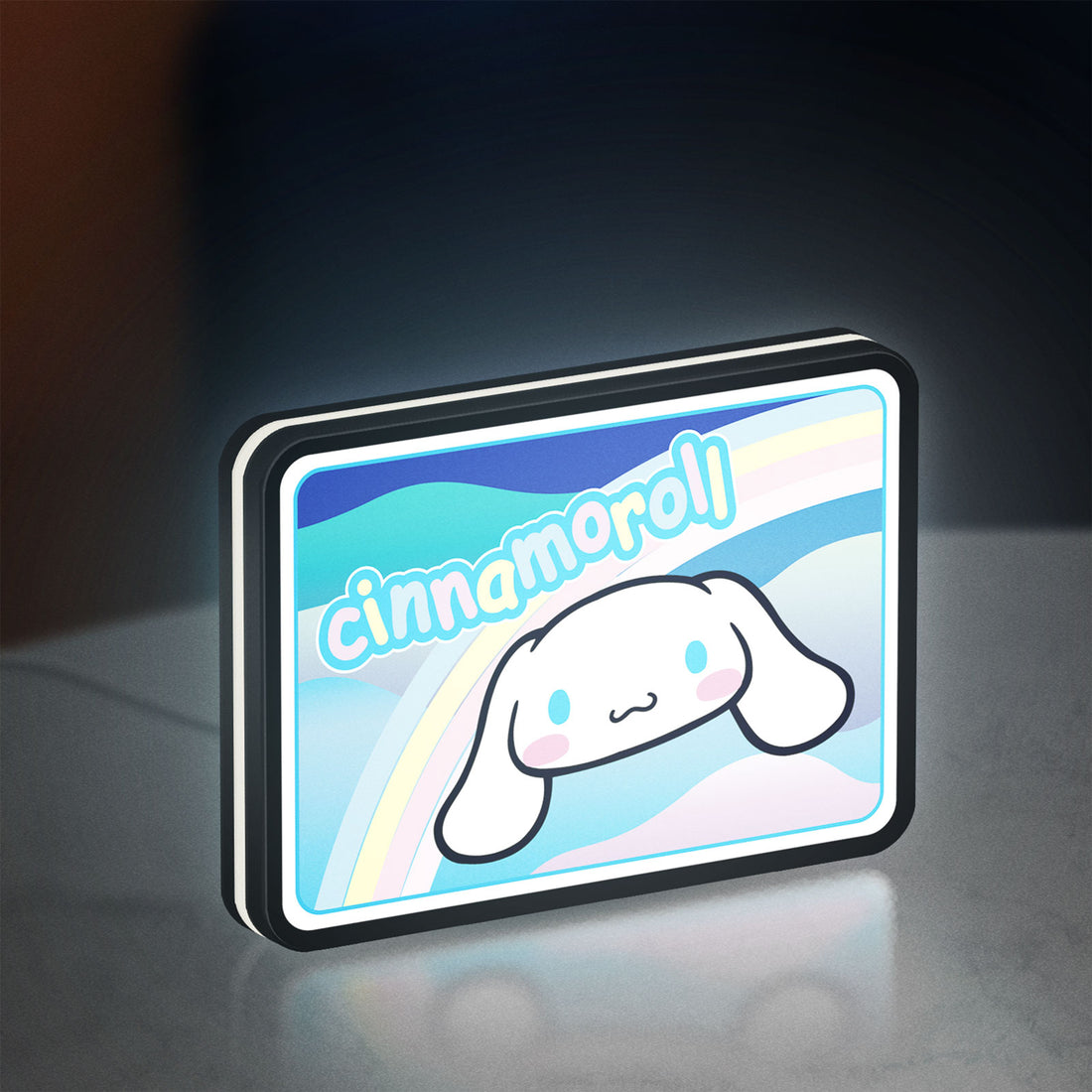 Cinnamoroll LED lightbox hanging on a wall with white glow