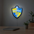 K-League Ulsan Hyundai LED lightbox hanging on a room wall with soft blue light