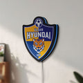 Unlit K-League Ulsan Hyundai LED lightbox mounted on a wall in daylight