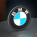 BMW LED lightbox standing on a desk from an angled side view with white glow