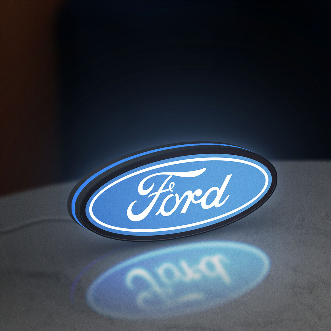 Ford LED lightbox hanging on a wall with blue glow