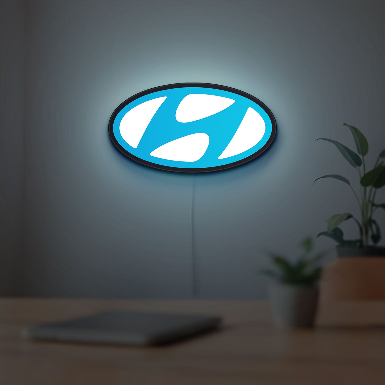 Hyundai LED lightbox hanging on a room wall with soft blue light