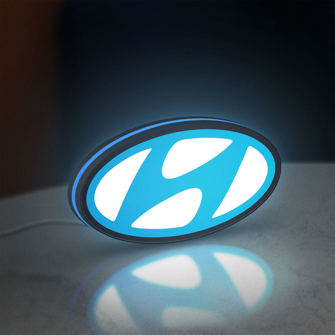 Hyundai LED lightbox hanging on a wall with blue glow