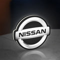 Nissan LED lightbox standing on a desk from an angled side view with white glow