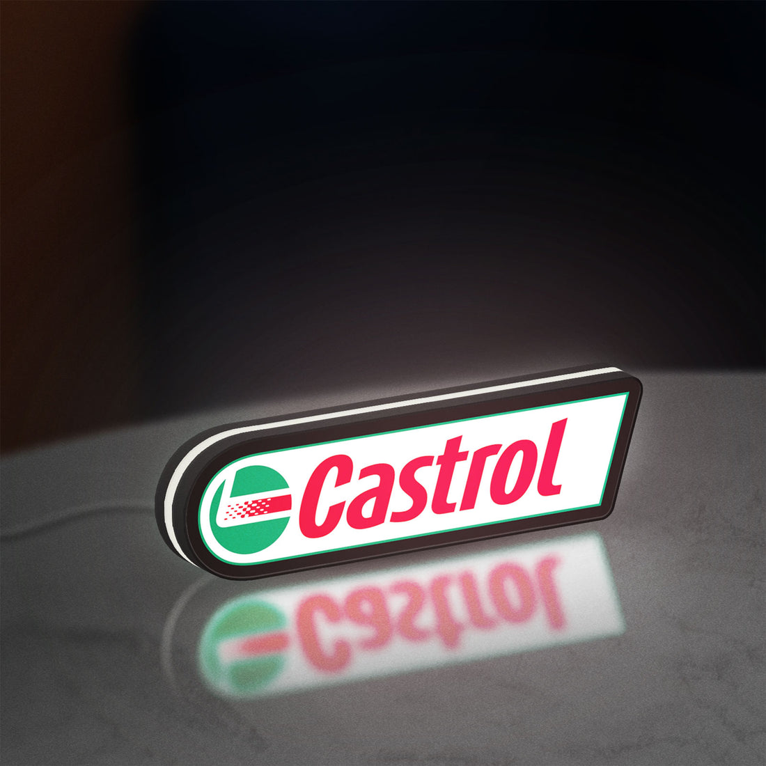 Castrol LED lightbox hanging on a wall with white glow