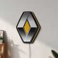 Unlit Renault LED lightbox mounted on a wall in daylight
