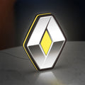 Renault LED lightbox standing on a desk from an angled side view with yellow glow