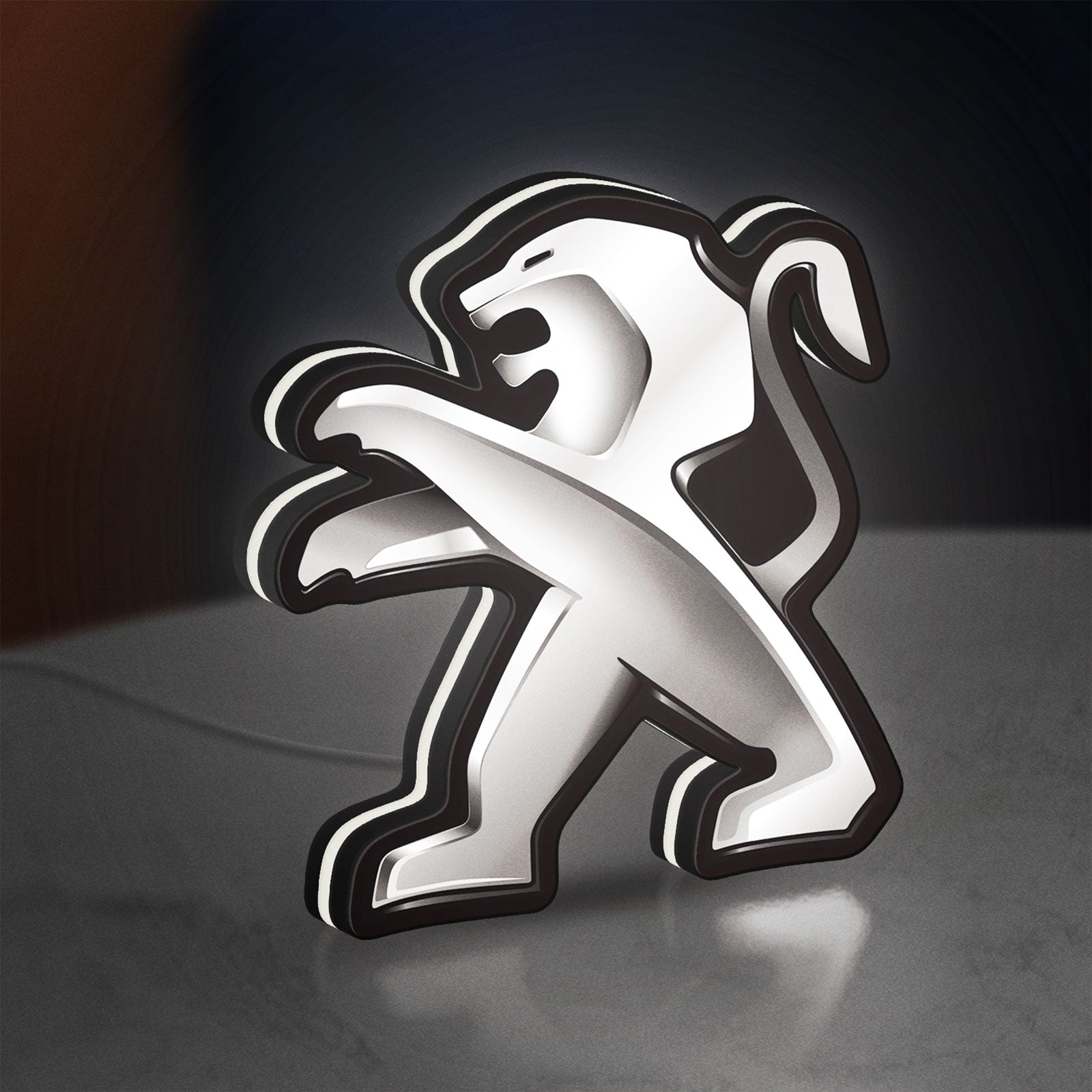 Peugeot LED lightbox standing on a desk from an angled side view with white glow