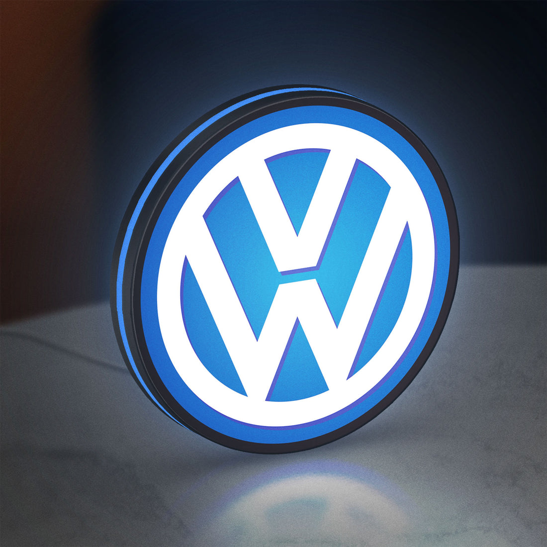 Volkswagen LED lightbox hanging on a wall with blue glow