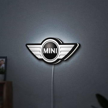 Mini Cooper LED lightbox hanging on a wall with white glow