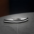 Mini Cooper LED lightbox lying flat on a desk with white glow