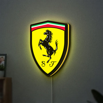 Ferrari GES LED lightbox hanging on a wall with yellow glow