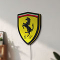 Unlit Ferrari GES LED lightbox mounted on a wall in daylight