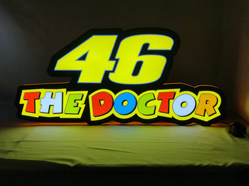 26Xbau0042 LED Sign (60cm) - The doctor led light box 01 lit standing front view, unique wall art for desk and room decor