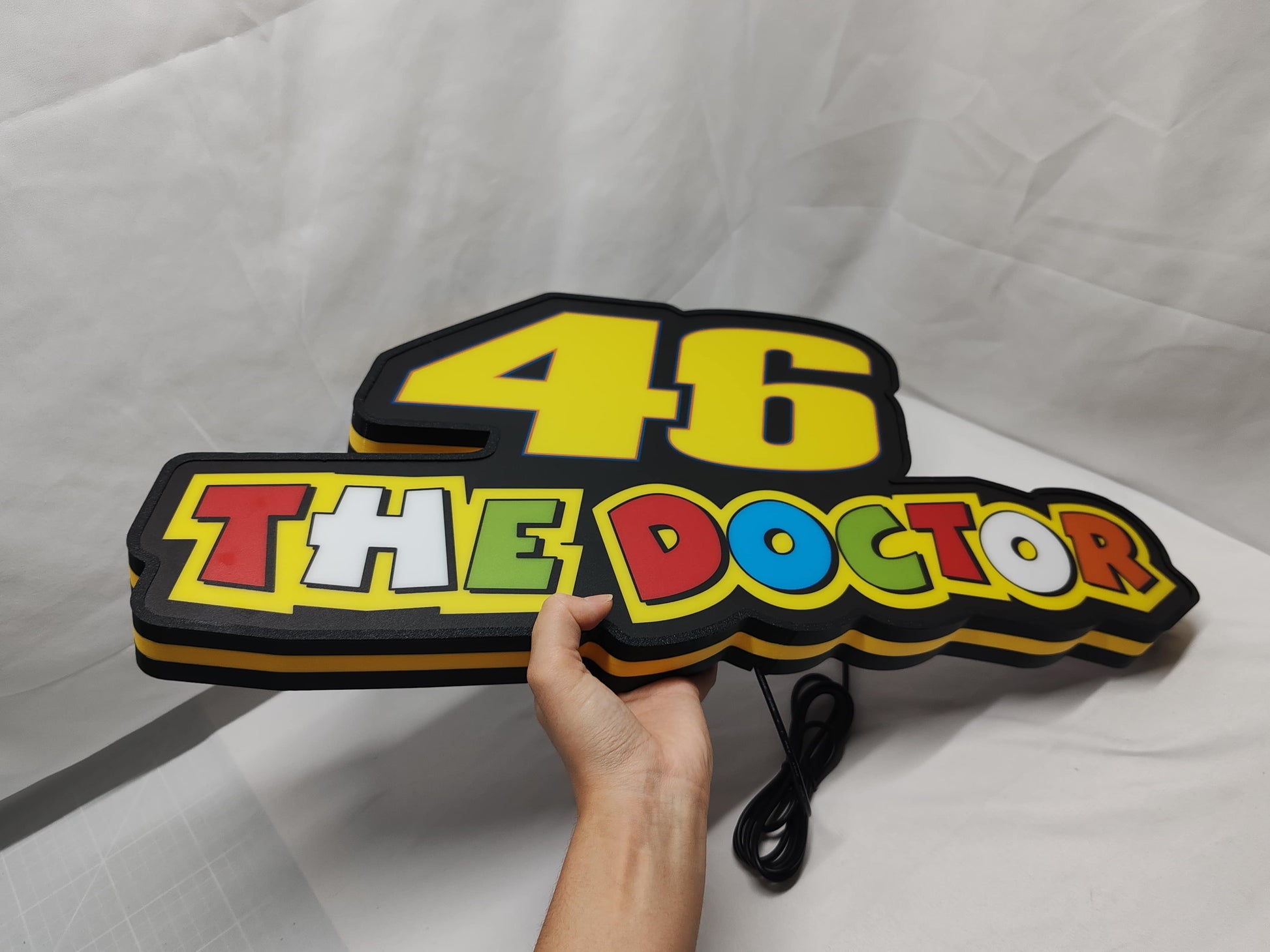 26Xbau0042 LED Light Box (60cm) - The doctor led light box 10 unlit handheld side view, unique wall art for desk and room decor