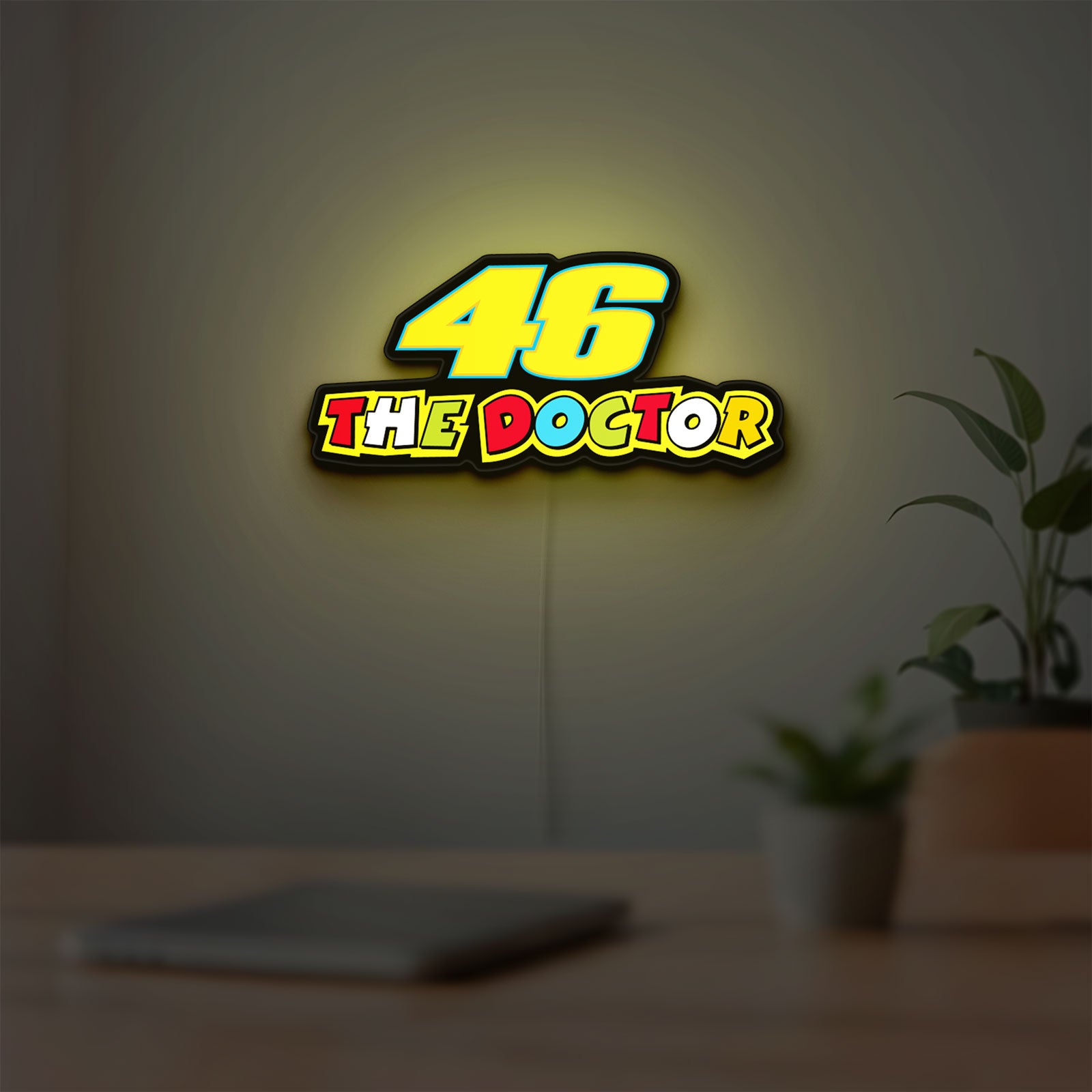 46 The Doctor LED lightbox hanging on a room wall with soft yellow light