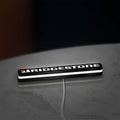 Bridgestone LED lightbox lying flat on a desk with white glow