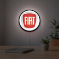 FIAT 2007 OLD LED lightbox hanging on a room wall with soft white light