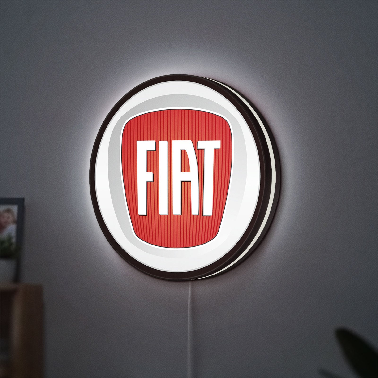 FIAT 2007 OLD LED lightbox hanging on a wall with white glow