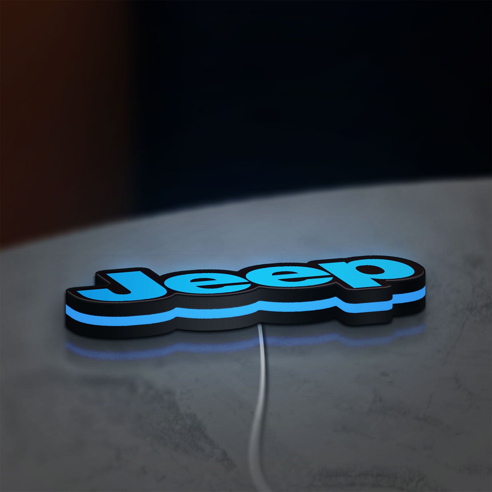 Jeep LED lightbox lying flat on a desk with blue glow