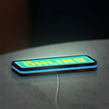 Ohlins LED lightbox lying flat on a desk with blue glow
