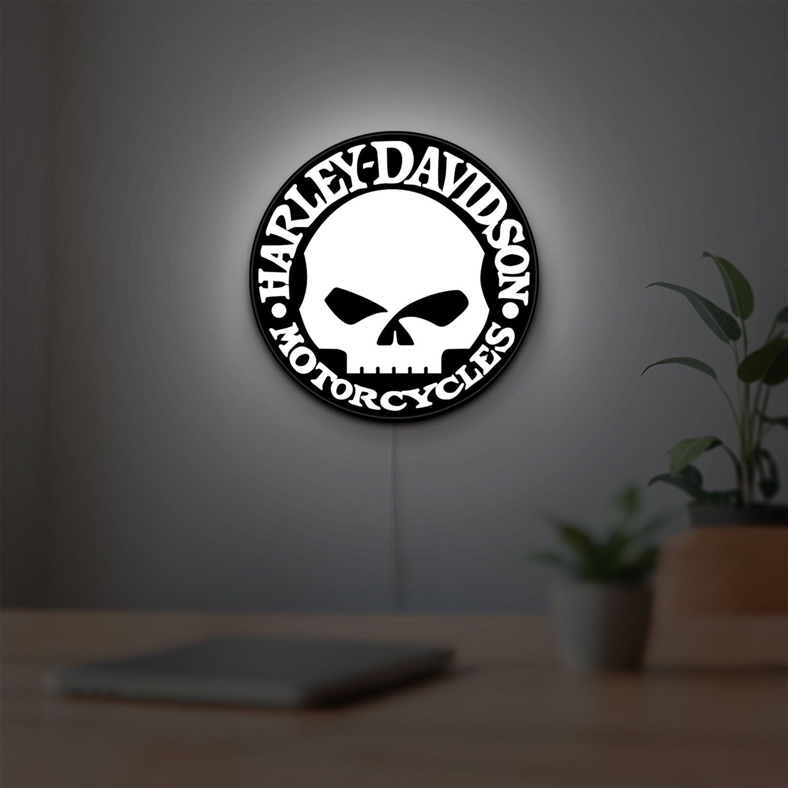 Harley Davidson Skull LED lightbox hanging on a room wall with soft white light