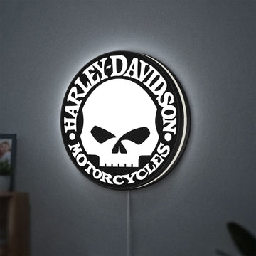 Harley Davidson Skull LED lightbox hanging on a wall with white glow