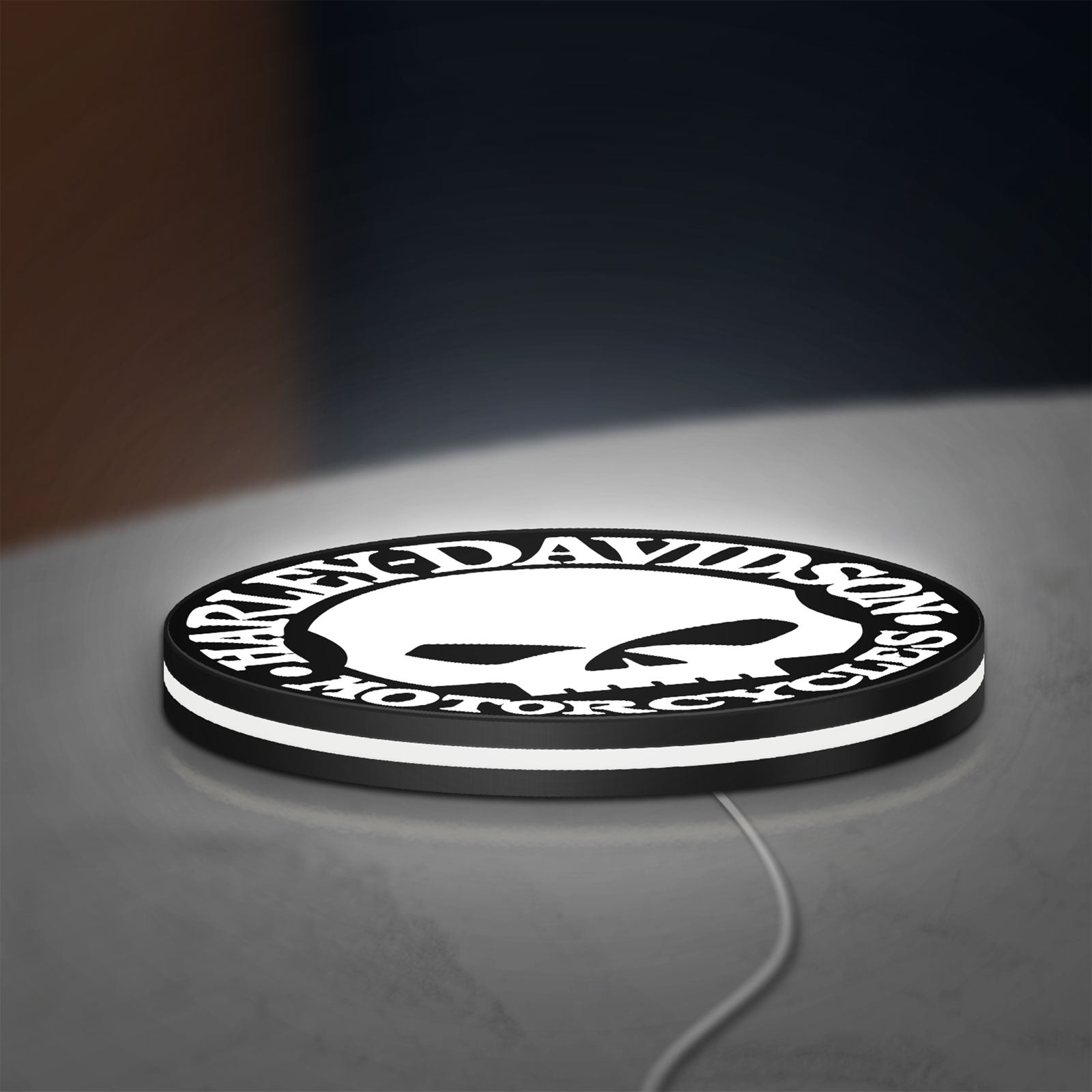 Harley Davidson Skull LED lightbox lying flat on a desk with white glow