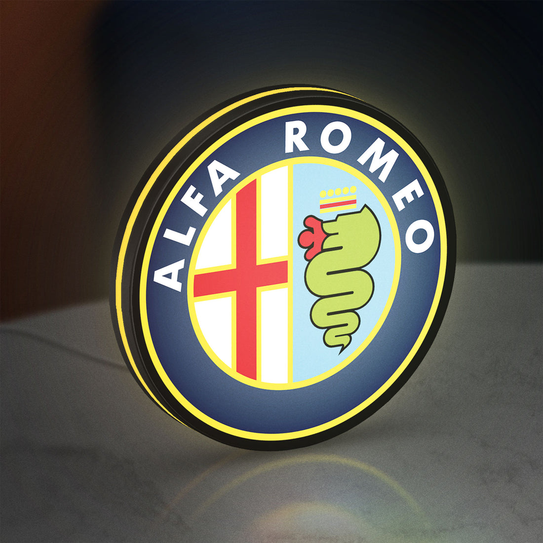 Alfa Romeo LED lightbox hanging on a wall with yellow glow